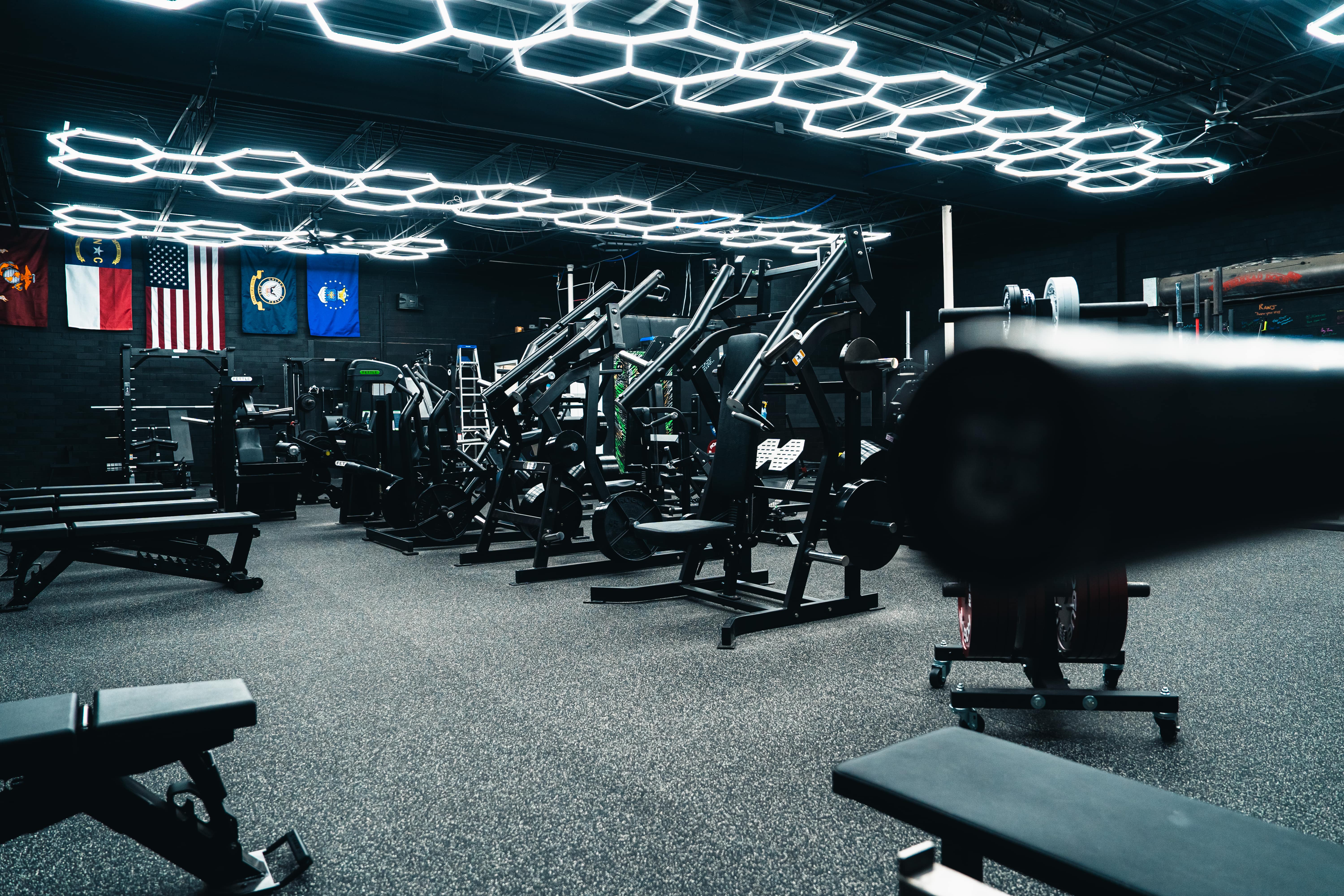 Plate-loaded machines at Archetype Strength fitness center near RTP, Morrisville NC